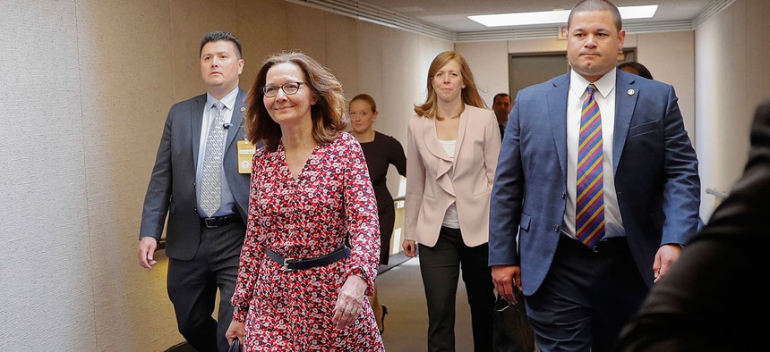 CIA Director Nominee Gina Haspel walks to a holding room before heading to her next meeting, on Capitol Hill on Monday.