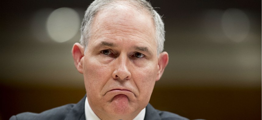 Scott Pruitt reacts while testifying before a Senate Appropriations subcommittee on May 16.