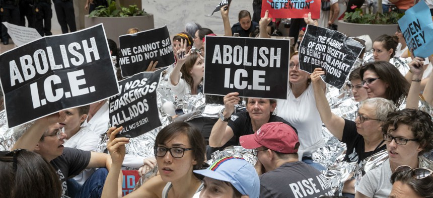 Hundreds of activists protest the Trump administration's approach to illegal border crossings in a demonstration at the Hart Senate Office Building on Capitol Hill on June 28.