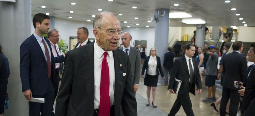Sen. Chuck Grassley, R-Iowa, walks to a subway car following a vote on Capitol Hill on July 11.