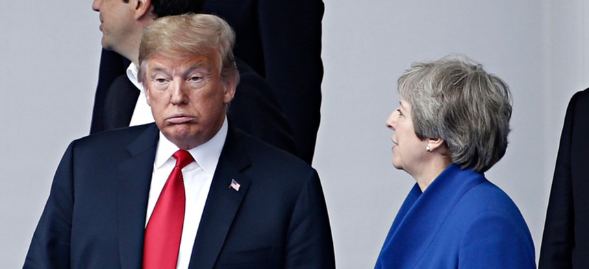  President Donald Trump and British Prime Minister Theresa May during NATO Summit 2018 in Brussels, Belgium.