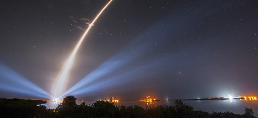 A United Launch Alliance (ULA) Atlas V rocket carrying the third Mobile User Objective System satellite for the U.S. Navy creates a light trail as it lifts off on Jan. 20, 2015.