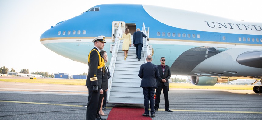   President Donald J. Trump and First Lady Melania Trump board Air Force One after the Helsinki summit on July 16.