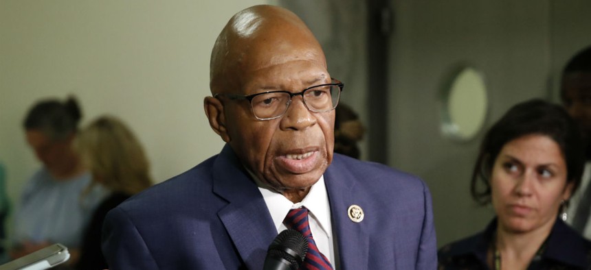 Rep. Elijah Cummings, D-Md., speaks with reporters in June. Cummings wrote a letter to HHS and CMS demanding information on the removal of Obamacare sections on agency websites. 