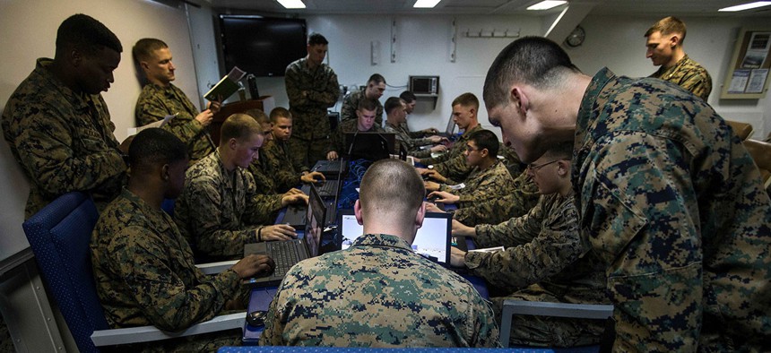 U.S. Marines assigned to Battalion Landing Team, 2nd Battalion, 6th Marine Regiment (BLT 2/6), 26th Marine Expeditionary Unit (MEU), conduct simulated squad-level integrated training with Virtual Battlespace Simulator.