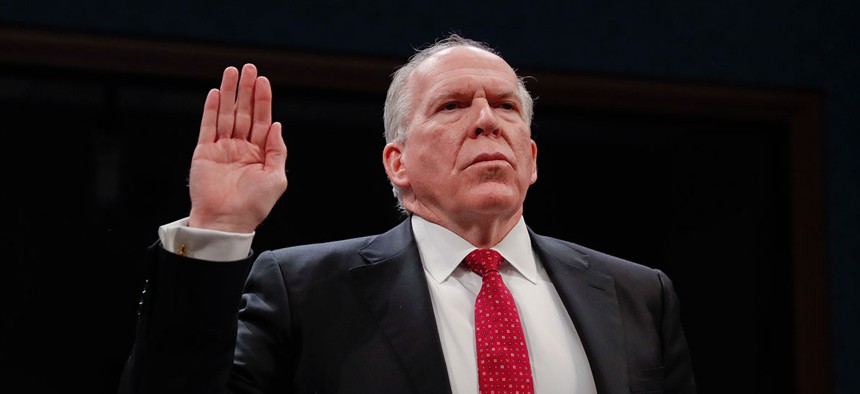 Former CIA Director John Brennan is sworn-in on Capitol Hill in Washington, Tuesday, May 23, 2017, prior to testifying before the House Intelligence Committee Russia Investigation Task Force. 
