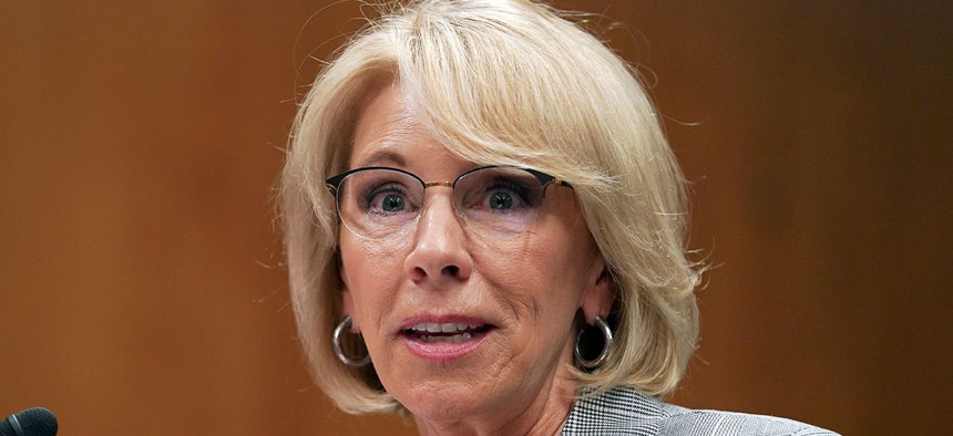 Betsy DeVos, the education secretary, is considering a proposal to allow school districts to pay for firearms and firearm training through a grant program in the federal law.