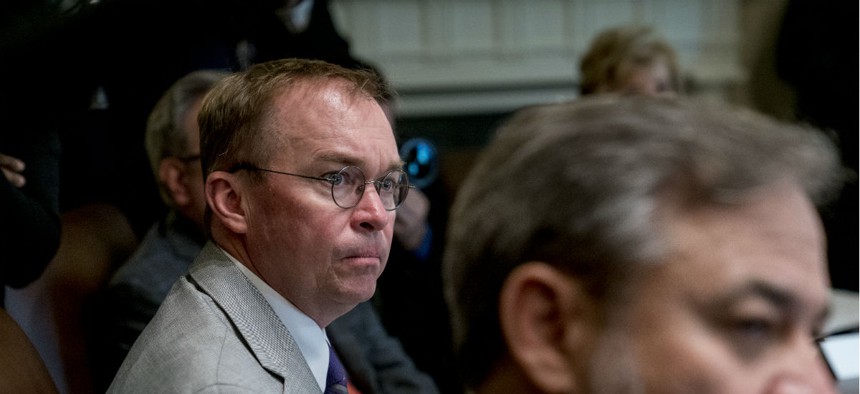 Budget Director Mick Mulvaney attends a cabinet meeting at the White House on Aug. 16.