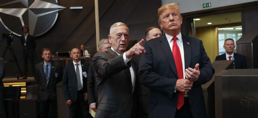 Defense Secretary James Mattis and President Trump arrive at the multilateral meeting of the North Atlantic Council in July in Brussels.