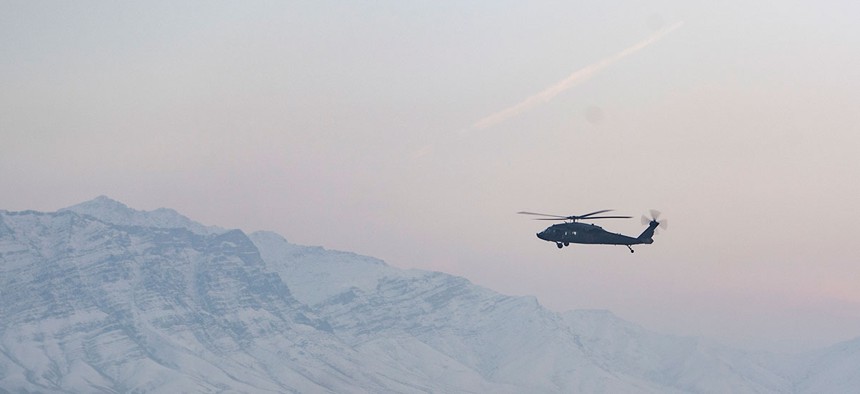 A helicopter flies over Bagram Air Field, Afghanistan, Jan. 30, 2018.