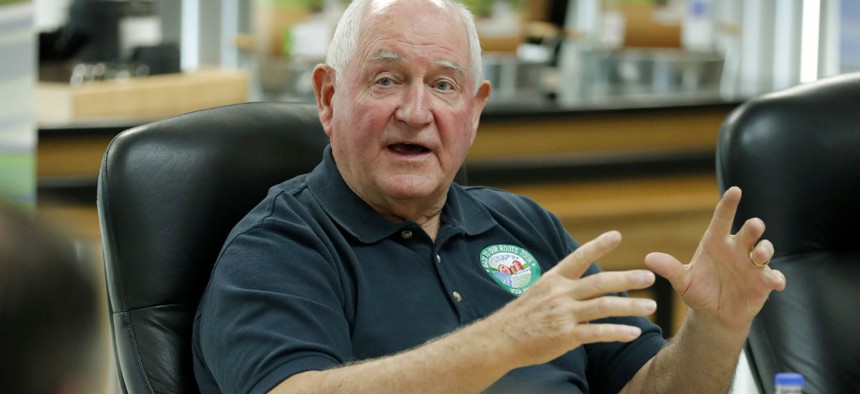 Agriculture Secretary Sonny Perdue participates in an August roundtable discussion in Iowa. 
