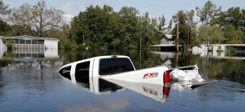 A truck in South Carolina is submerged in floodwaters after Hurricane Florence. 