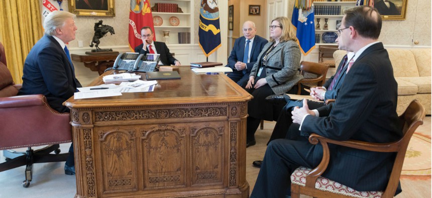 President Trump meets with GSA Administrator Emily Murphy and other administration officials on Jan. 24. 