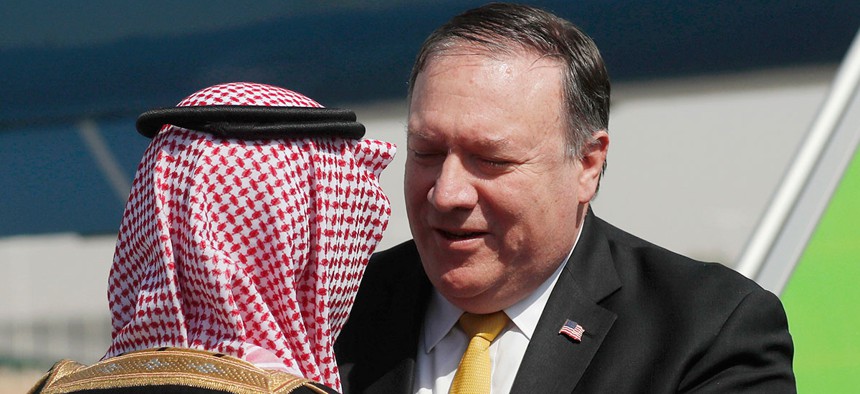 Mike Pompeo, right, greets Saudi Foreign Minister Adel al-Jubeir, after arriving in Riyadh on Tuesday.