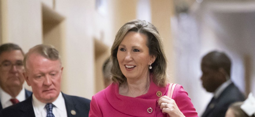 Rep. Barbara Comstock, R-Va., walks to a closed-door GOP strategy session at the Capitol in June.