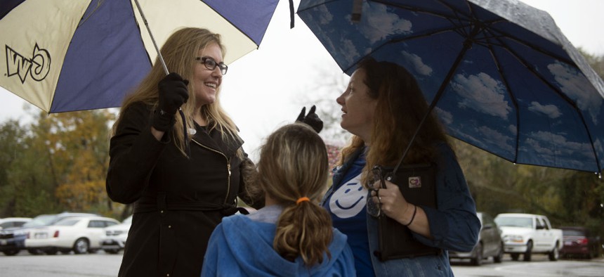 Virginia Democratic congressional candidate Jennifer Wexton greets voters at the Clarke County School Offices in Berryville, Va., on Tuesday. Wexton beat incumbent Republican Rep. Barbara Comstock. 