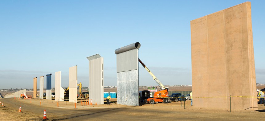 Ground views of different Border Wall Prototypes as they take shape during the Wall Prototype Construction Project near the Otay Mesa Port of Entry are shown in 2017.