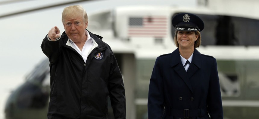 President Trump walks from Marine One helicopter to board Air Force One for a trip to visit areas impacted by the California wildfires on Nov. 17.