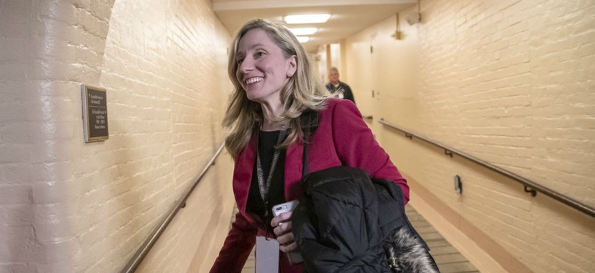 Abigail Spanberger heads to a Democratic Caucus meeting in the basement of the Capitol on Nov. 15.