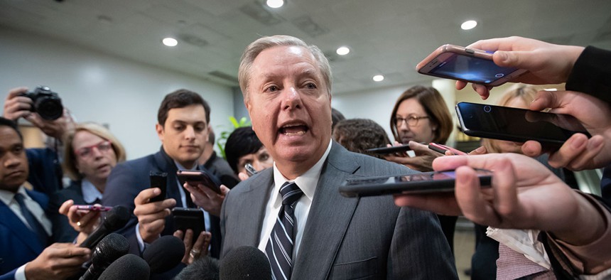 Sen. Lindsey Graham, R-S.C., speaks to reporters at the Capitol after a briefing by CIA Director Gina Haspel on the slaying of Saudi journalist Jamal Khashoggi in Washington on Dec. 4, 2018.