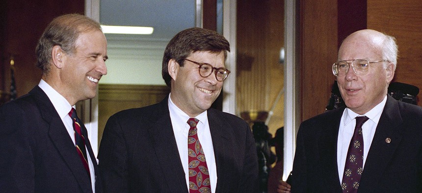 Attorney General nominee William Barr is flanked by Sen. Joseph Biden, D-Del., chairman of the Senate Judiciary Committee, left, and Sen. Patrick Leahy, D-Vt., prior to Barr’s nomination hearing before the committee on Capitol Hill in Washington 1991.