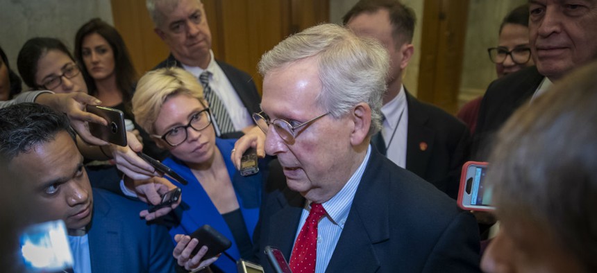 Senate Majority Leader Mitch McConnell spoke to reporters Friday about efforts to avoid a partial government shutdown. 