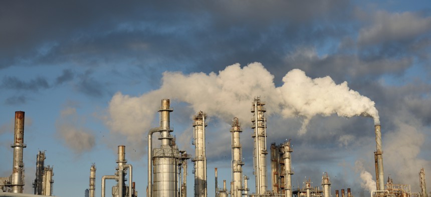 Oil refiners are fined for exceeding air pollution limits when rules are enforced. 