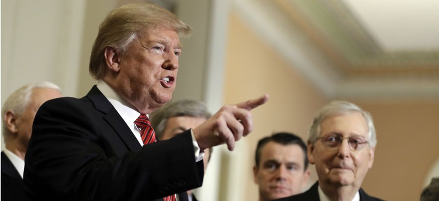 Trump speaks following a Senate Republican policy lunch Wednesday. The president reportedly walked out on shutdown negotiations when Democrats would not support his request for the wall. 