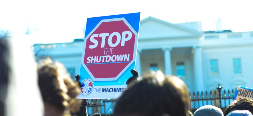 Federal employees and their allies rallied outside the White House on Jan. 10.