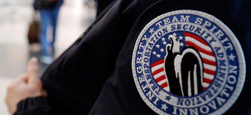 A TSA worker is shown at Chicago's O'Hare International Airport in December.