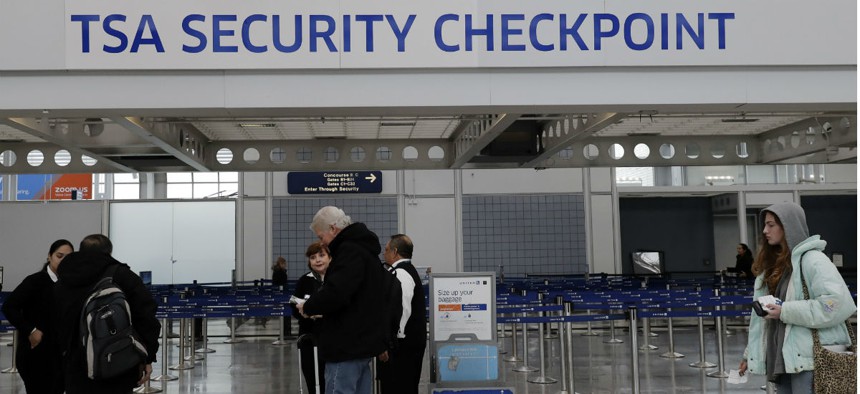 A security checkpoint at Chicago's O'Hare International Airport. TSA agents have started calling in sick at greater rates than usual as the shutdown drags on. 