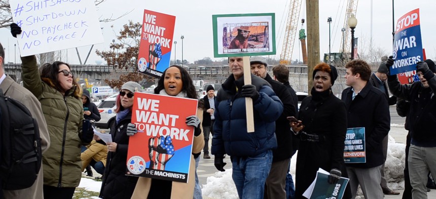 Federal employees and their allies rallied against the shutdown in Washington on Jan. 17.