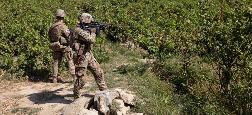 U.S. troops patrol Dolana village of Parwan province, Afghanistan, in 2014.