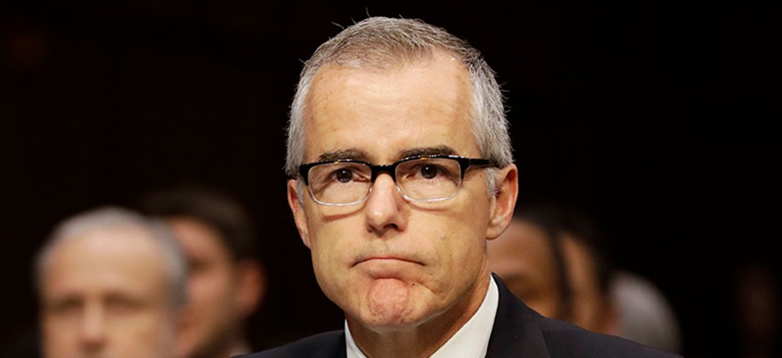 Andrew McCabe listens on Capitol Hill in 2017 during a hearing.
