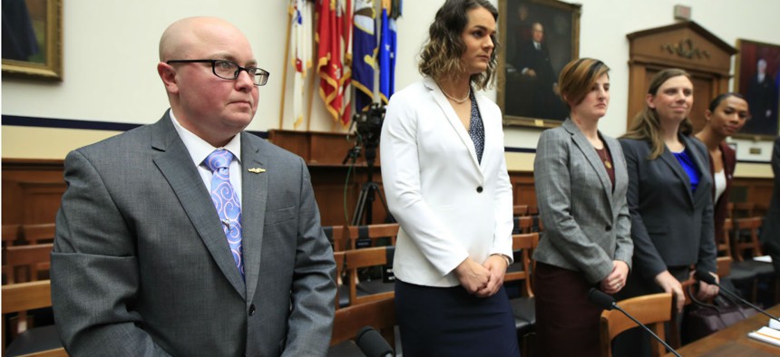 From left, transgender military members Navy Lt. Cmdr. Blake Dremann, Army Capt. Alivia Stehlik, Army Capt. Jennifer Peace, Army Staff Sgt. Patricia King and Navy Petty Officer Third Class Akira Wyatt, attend a February hearing on Capitol Hill. 