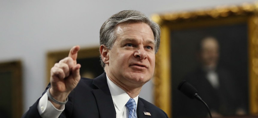 FBI Director Christopher Wray testifies before an appropriations subcommittee on Thursday. 