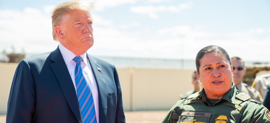 President Donald J. Trump , meeting with reporters, speaks with Gloria Chavez, the Chief Patrol Agent, El Centro Sector for U.S. Customs and Border Protection on April 5.