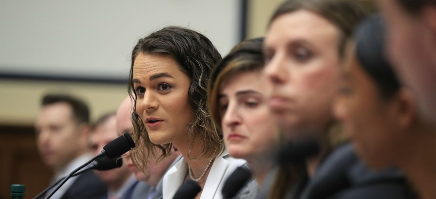 Army Capt. Alivia Stehlik, fourth from right, together with other transgender military members testify about their service before a House Armed Services Subcommittee on Military Personnel on Feb. 27.