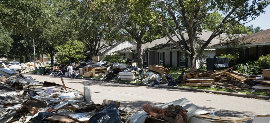 Debris from Hurricane Harvey lines the streets of Houston in 2017. 