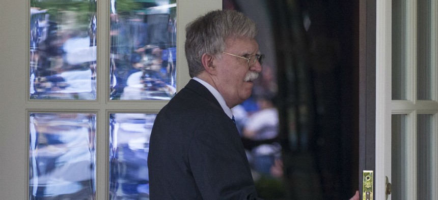 National Security Adviser John Bolton enters the West Wing of the White House, Friday, May 3, 2019, in Washington.