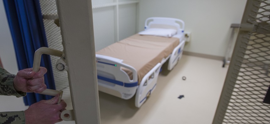 In this photo reviewed by U.S. military officials, a hospital bed is shown inside the converted Camp V detention facility, Wednesday, April 17, 2019, in Guantanamo Bay Naval Base, Cuba.