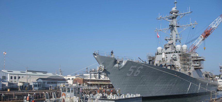 USS John S. McCain (DDG 56) prepares to depart from a dry dock at Fleet Activities Yokosuka in 2018.