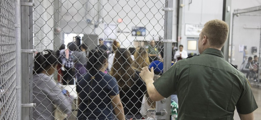 A Border Patrol agent at the Central Processing Center in McAllen, Texas, in 2018.