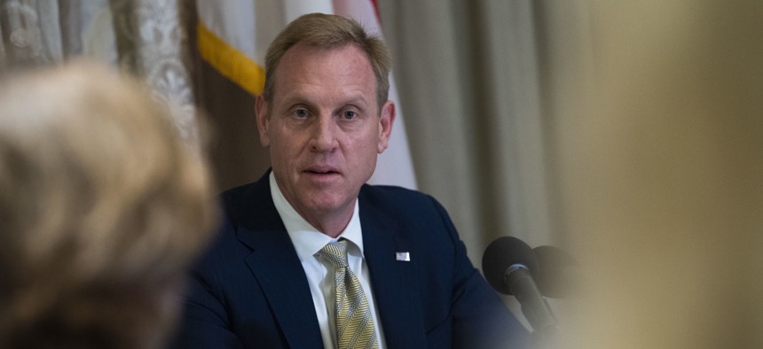 U.S. Acting Secretary of Defense Patrick M. Shanahan speaks with reporters at the IISS Shangri-La Dialogue 2019, Singapore, May 31, 2019.