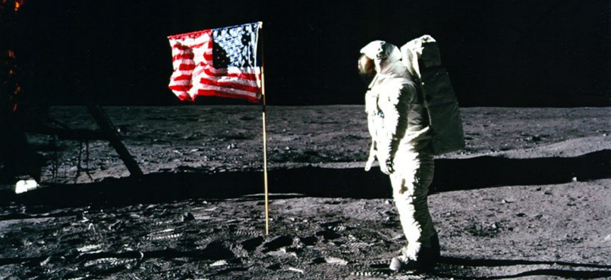 Astronaut Buzz Aldrin salutes the American flag during the Apollo 11 mission.