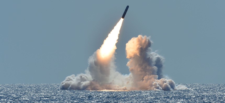 An unarmed Trident II D5 missile launches from the Ohio-class ballistic missile submarine USS Nebraska (SSBN 739) off the coast of California, March 26, 2008.