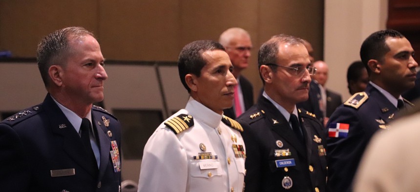 Gen. Dave Goldfein, the U.S. Air Force chief of staff and Col. Manuel Calderon, the El Salvador air chief at the Conference of the American Air Chiefs.