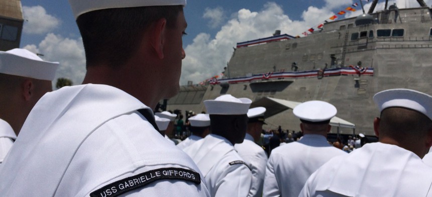 USS Gabrielle Giffords (LCS 10) Sailors stand in formation during a commissioning ceremony held in the Port of Galveston in 2017.