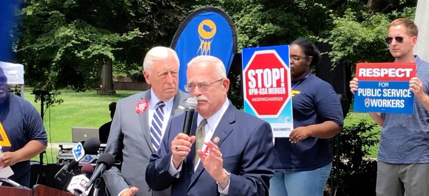 Rep. Gerry Connolly, D-Va.,  speaks at Tuesday's rally opposing the OPM-GSA merger. Connolly plans to introduce an appropriations bill amendment that would prevent the furloughs the OPM director has threatened. 