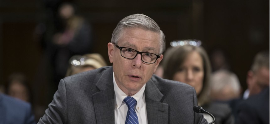 National Background Investigation Bureau Director Charlie Phalen testifies before the Senate Intelligence Committee in March 2018.